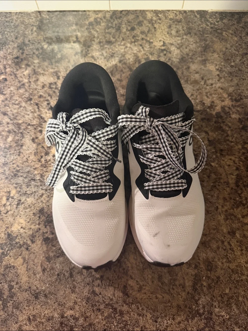 On Running White and Black Cloud-Style Sneakers